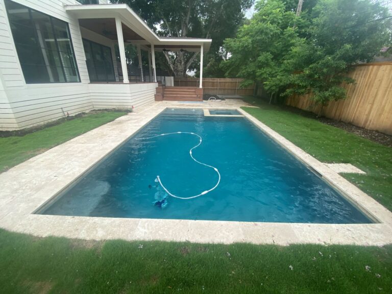 A pool with a hose attached to it